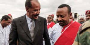 Image — On 9 November 2018, Ethiopia's Prime Minister Abiy Ahmed, right, welcomes Eritrea's President Isaias Afwerki at the airport in Gondar for a visit to Ethiopia. EDUARDO SOTERAS/AFP via Getty Images.